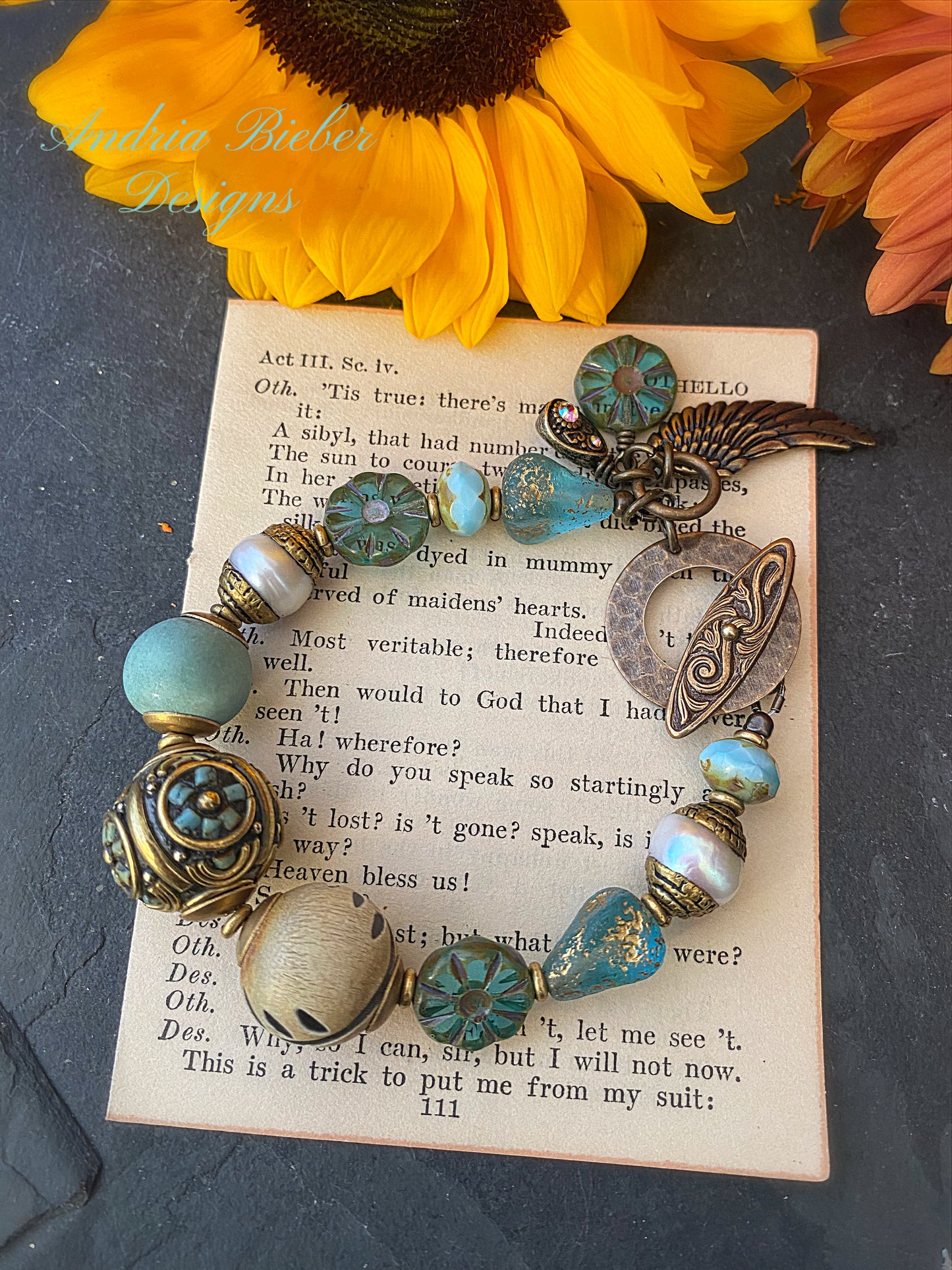 Hammered hoop and filigree toggle bar clasp. Chocolate brown bronze metal.