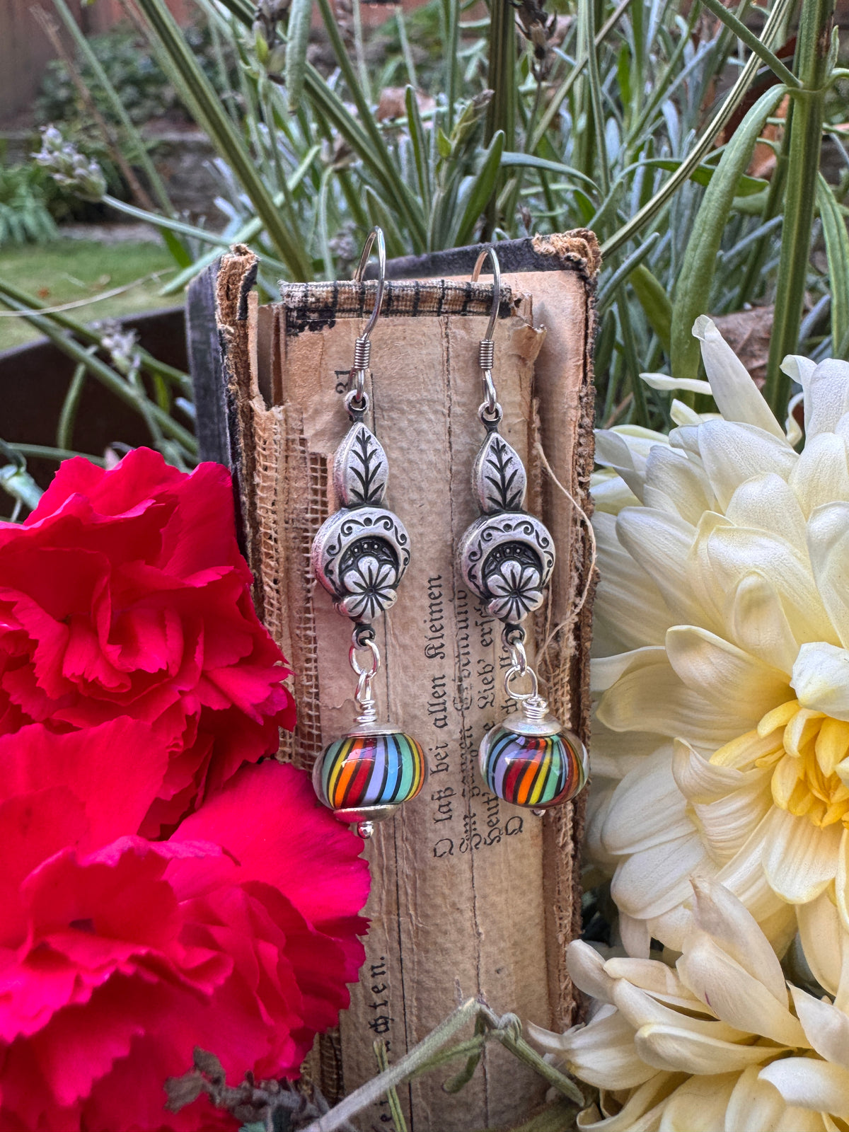 Handmade lampwork glass in rainbows, silver filigree drop, earrings.