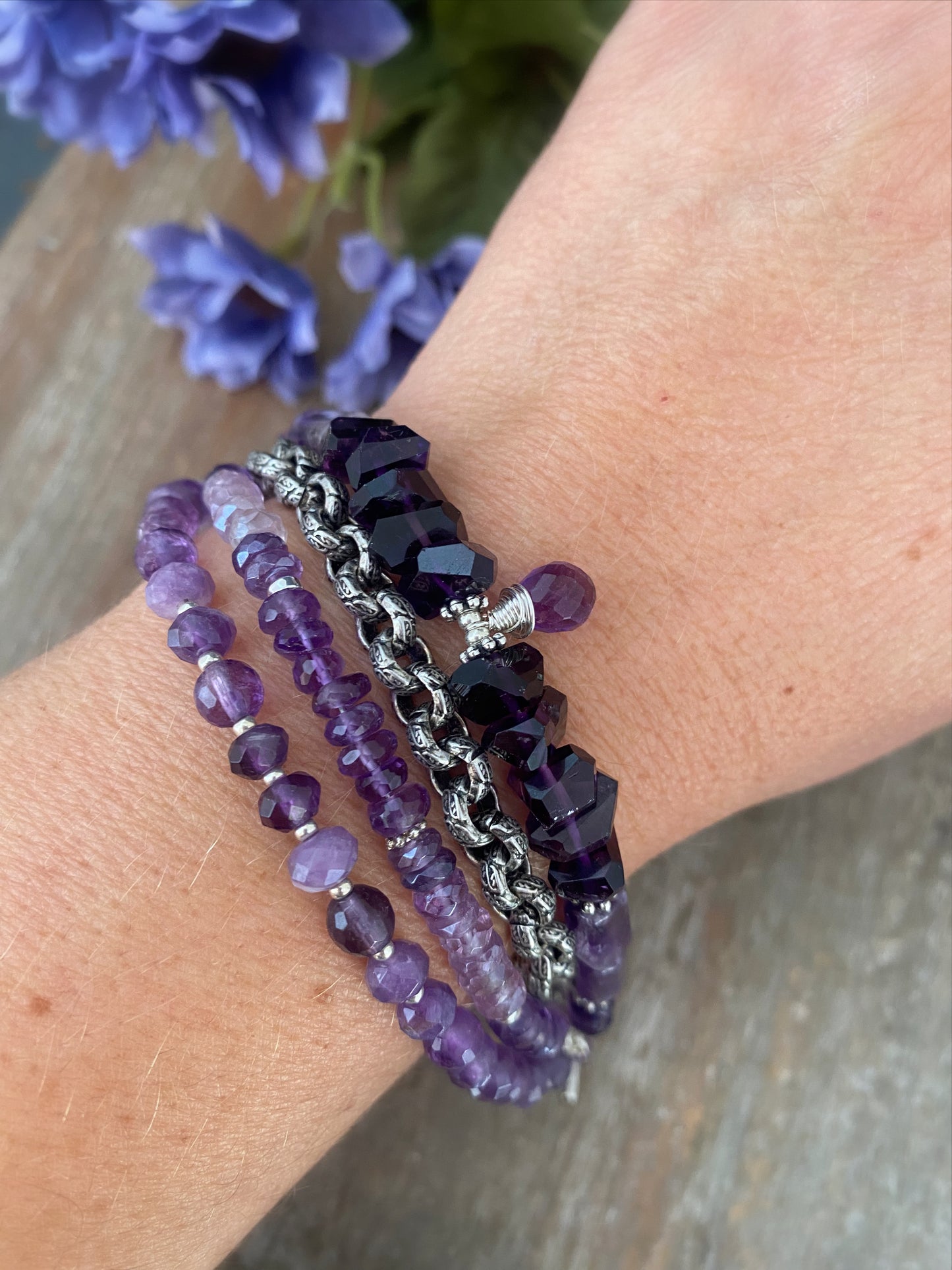 MAmethyst gemstone and silver metal, multi strand bracelet.
