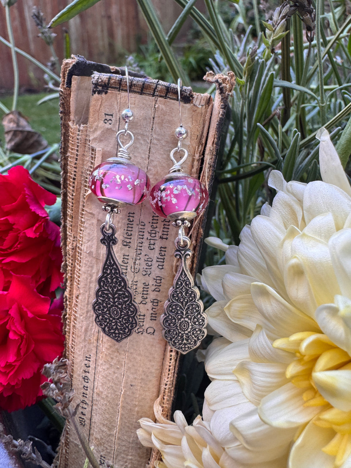 Handmade lampwork glass in pink and black, silver filigree drop, earrings.