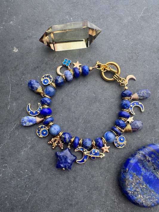 Space Charm bracelet. Mixed gemstone, charms and gold metal bracelet.