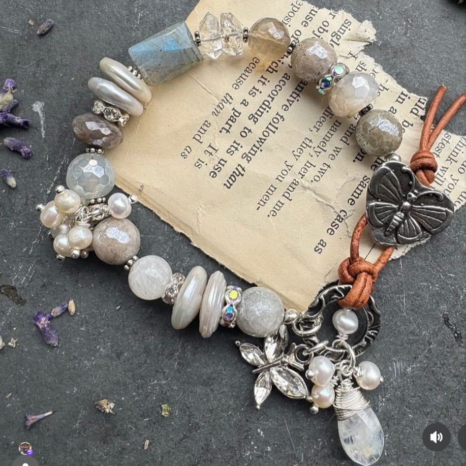 Herkimer diamonds, pearls, moonstone, labradorite, selenite, button, leather, bracelet.
