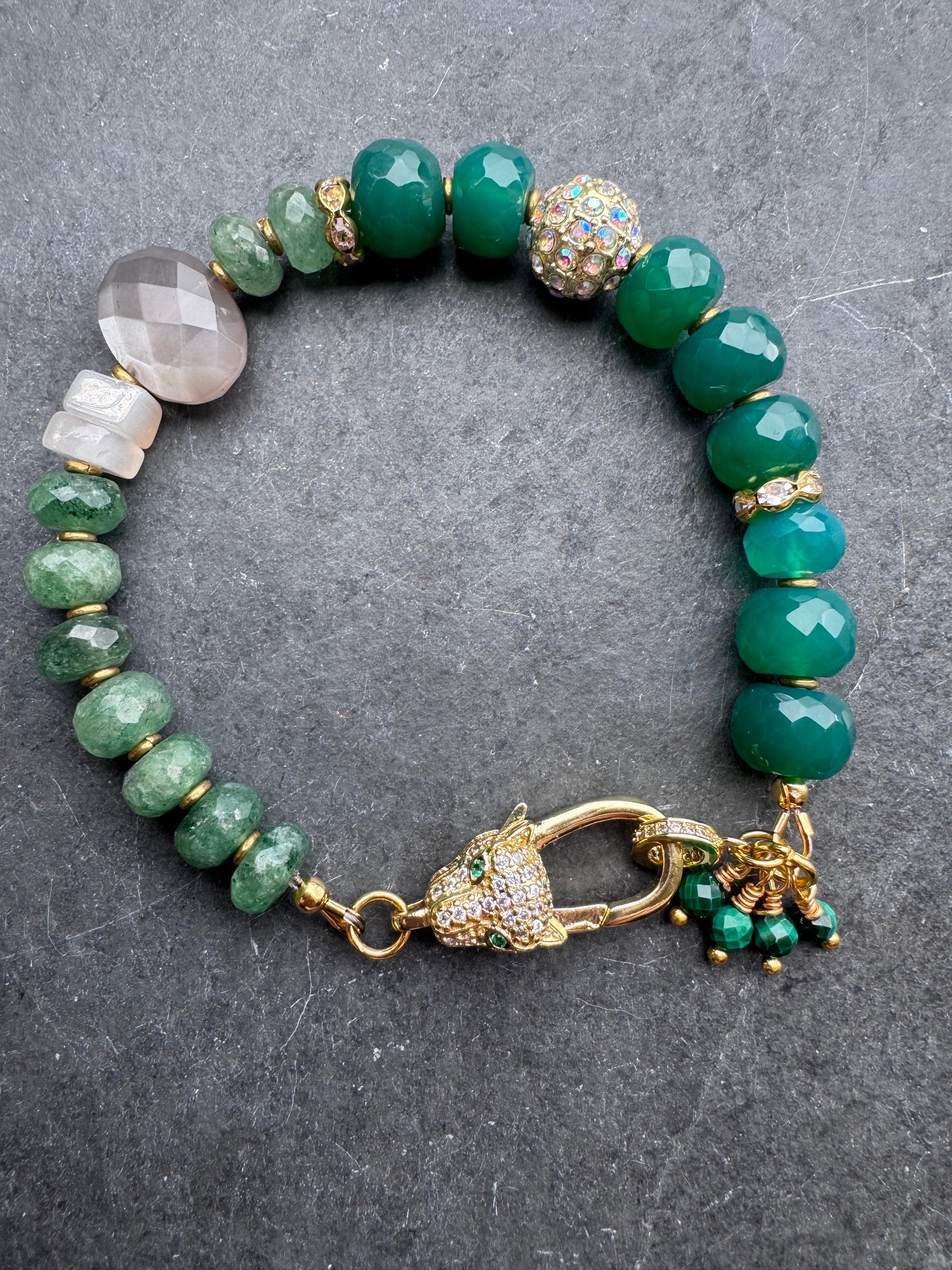 Green onyx faceted stone, green quartz, moonstone,jaguar gold rhinestone clasp.