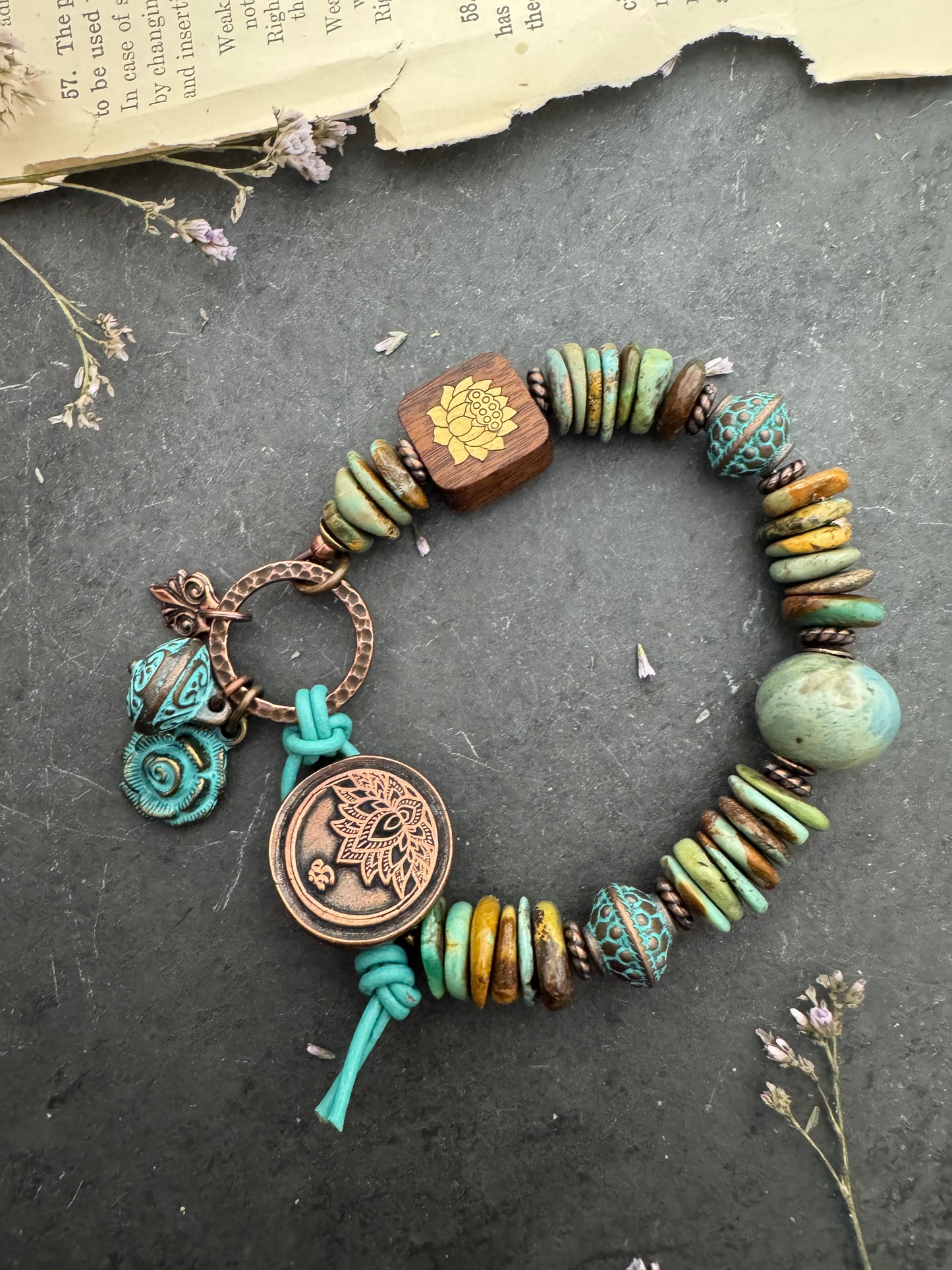 Turquoise stone, ceramic, wood, copper metal, button bracelet.