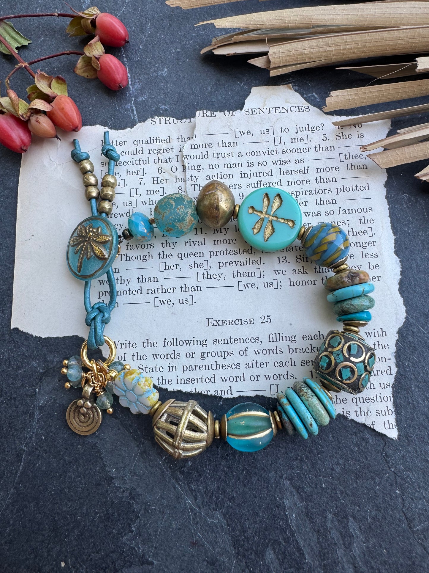 Turquoise stone, Czech glass,African glass, brass metal, bracelet. Czech Button and leather closure.
