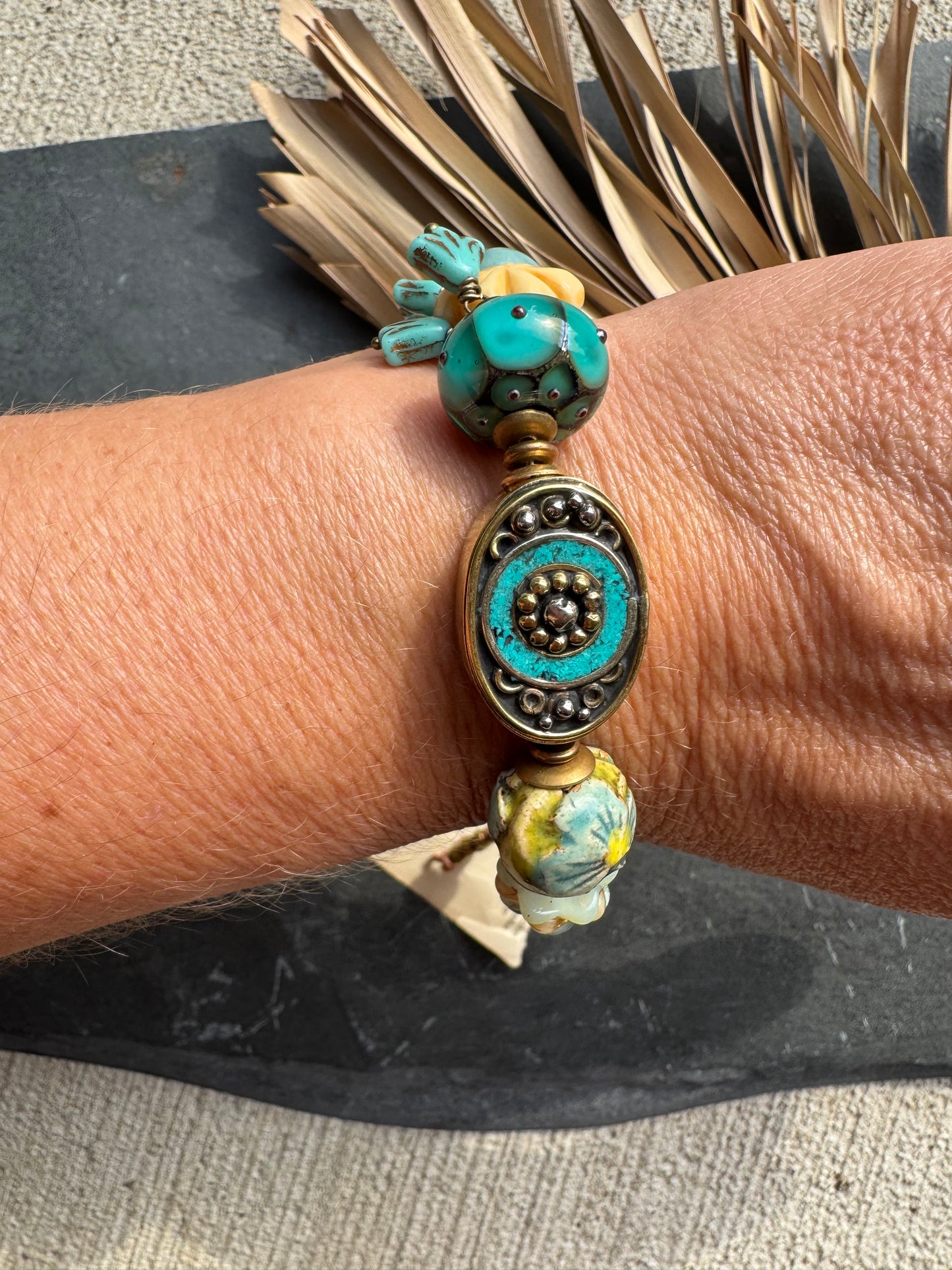 Handmade lampwork glass, Czech glass, ceramic, Indonesian with turquoise bead, bone flower and African brass, button flower, bracelet
