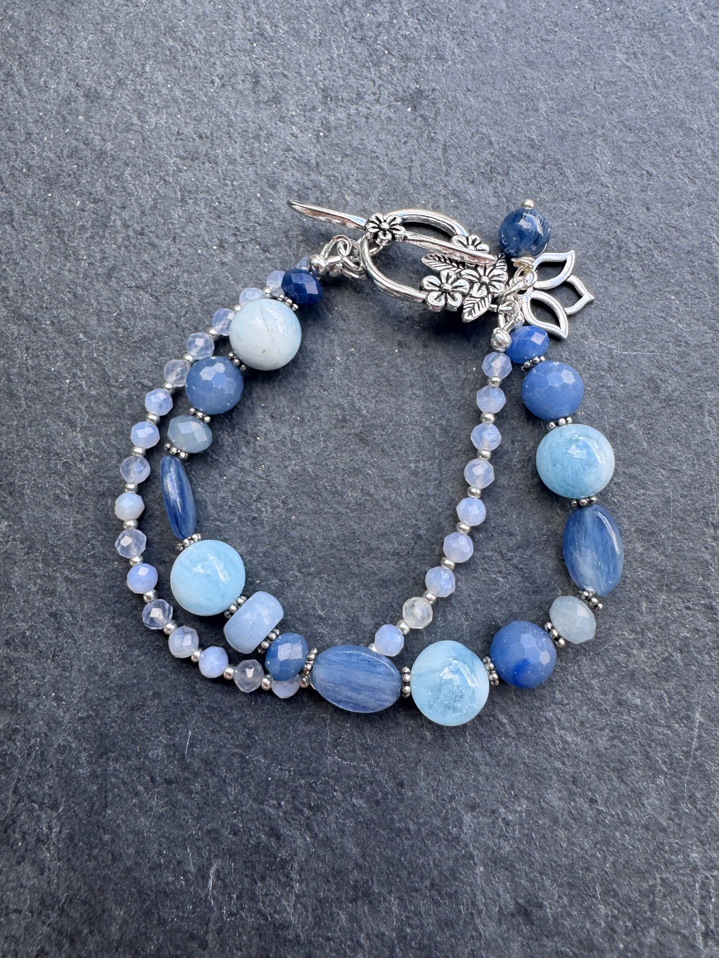 Kyanite and aquamarine gemstone and silver metal bracelet.
