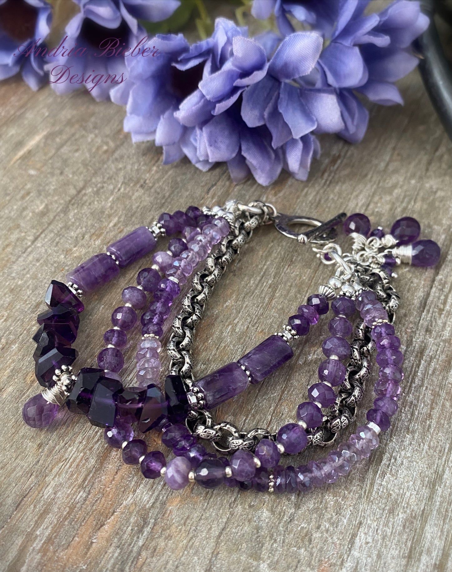 MAmethyst gemstone and silver metal, multi strand bracelet.