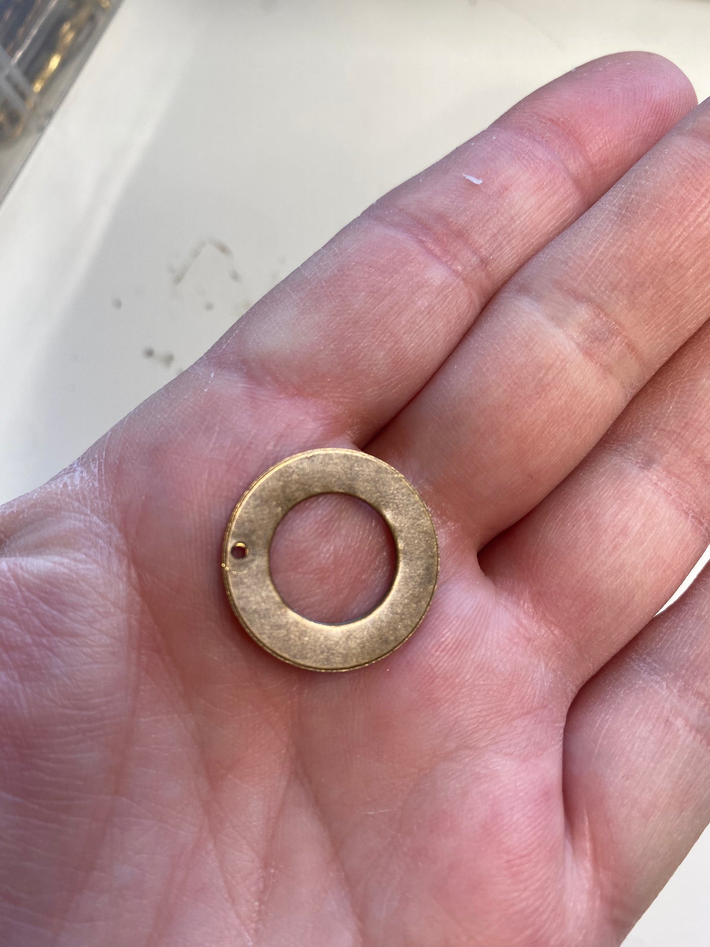 Hammered hoop and filigree toggle bar clasp. Chocolate brown bronze metal.