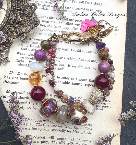 Ruby. Mixed gemstone, lampwork glass, rhinestone clasp.