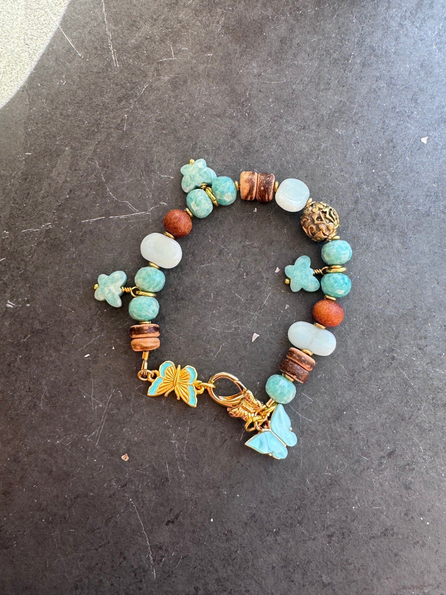Amazonite, wood, gold metal charm bracelet.