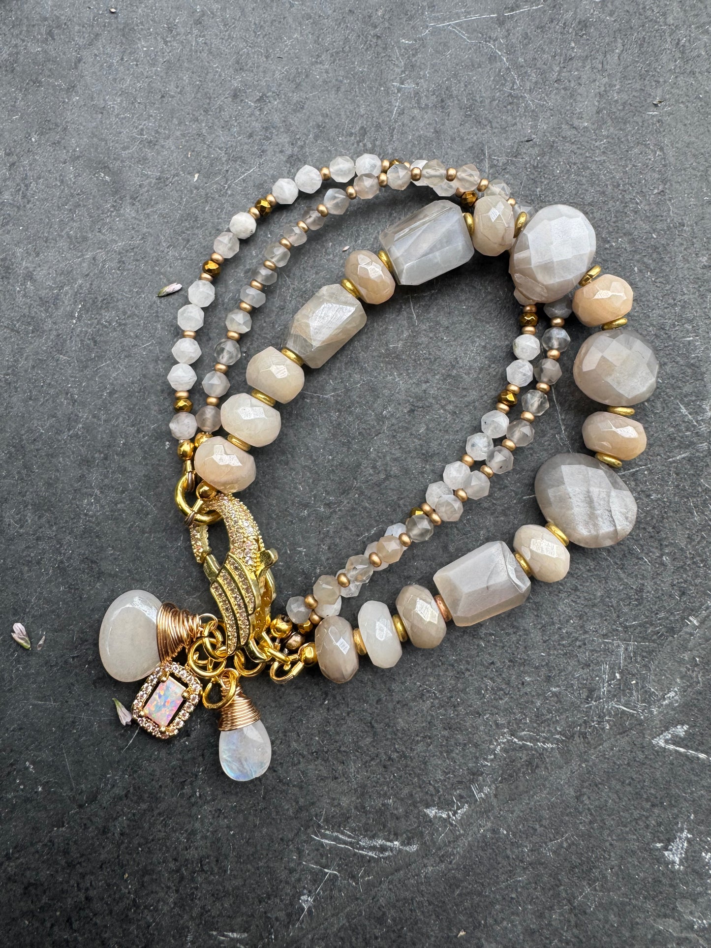 Moonstone, rhinestone clasp, multi strand, gold metal, bracelet.