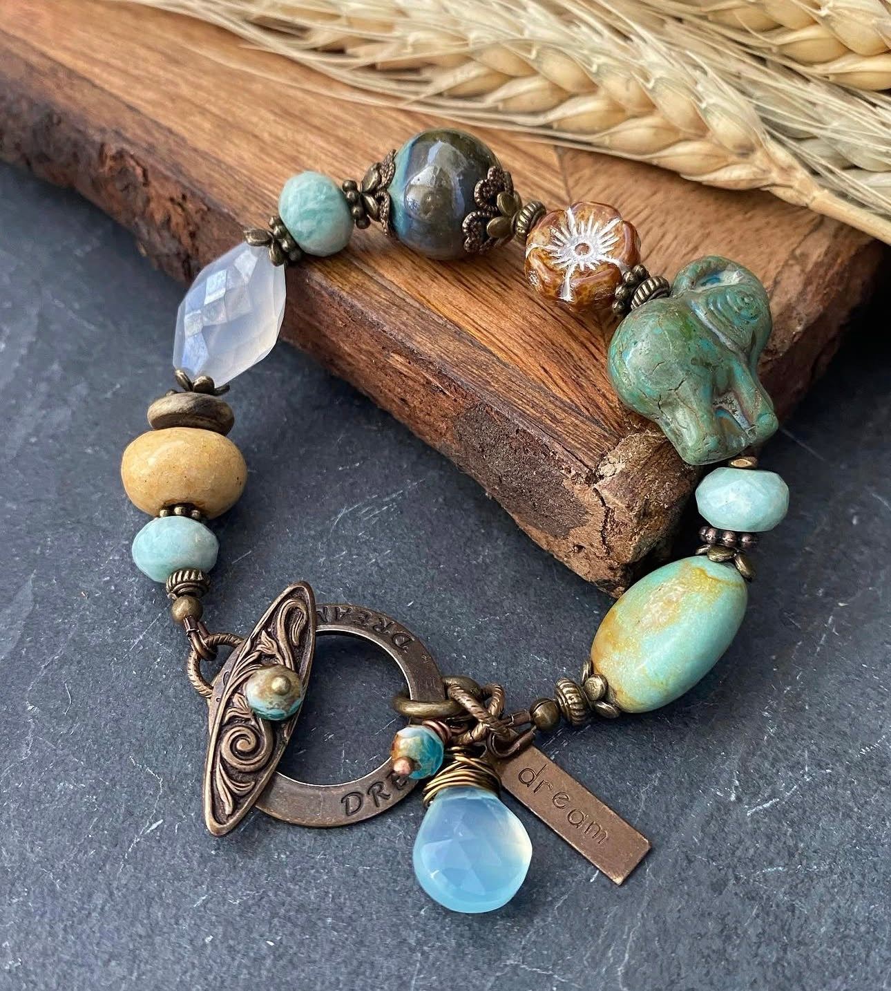Turquoise, chalcedony, ceramic, Czech glass, Vintaj brass bracelet.