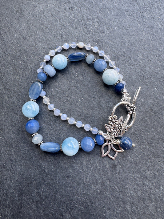 Kyanite and aquamarine gemstone and silver metal bracelet.