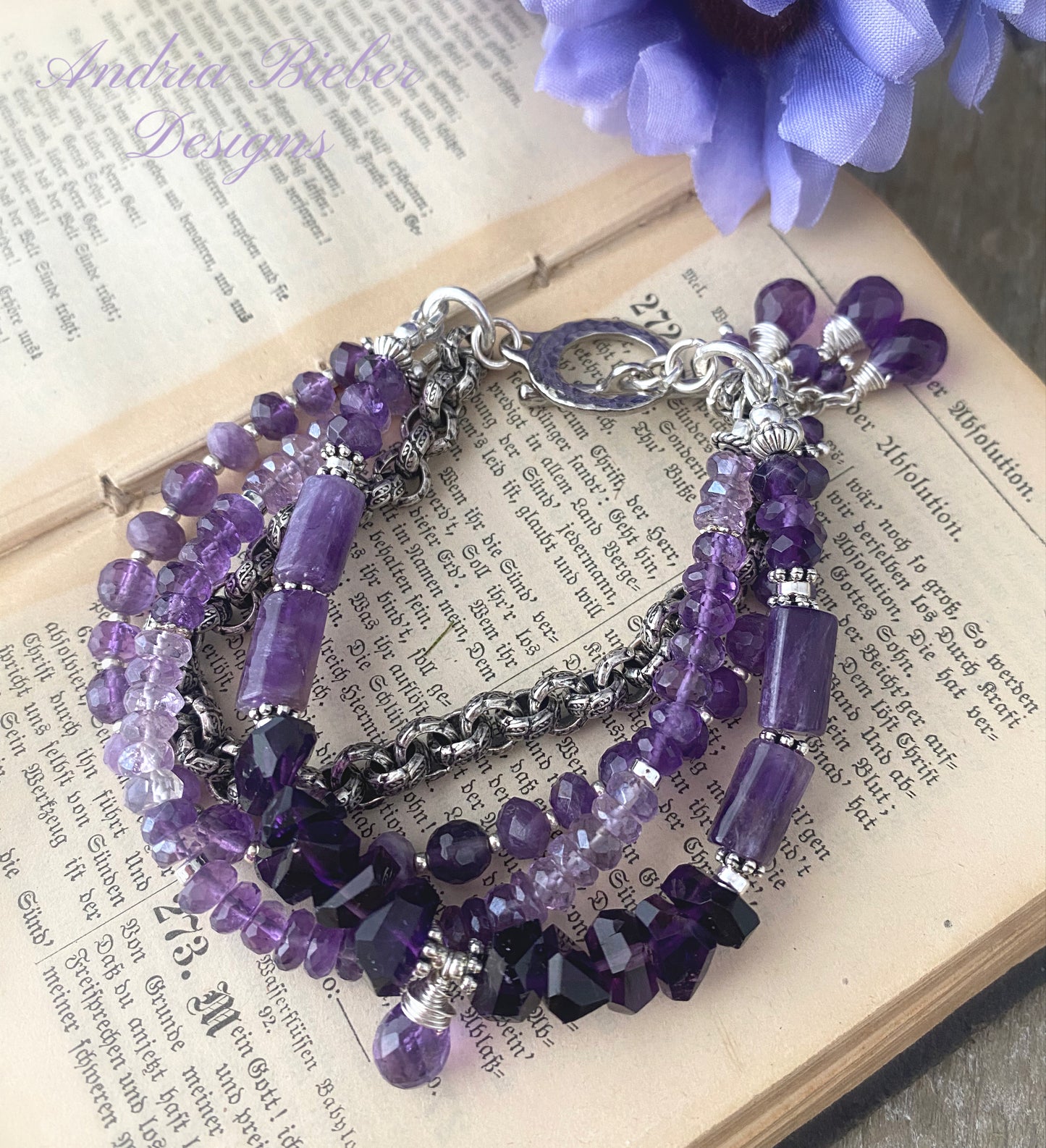 MAmethyst gemstone and silver metal, multi strand bracelet.