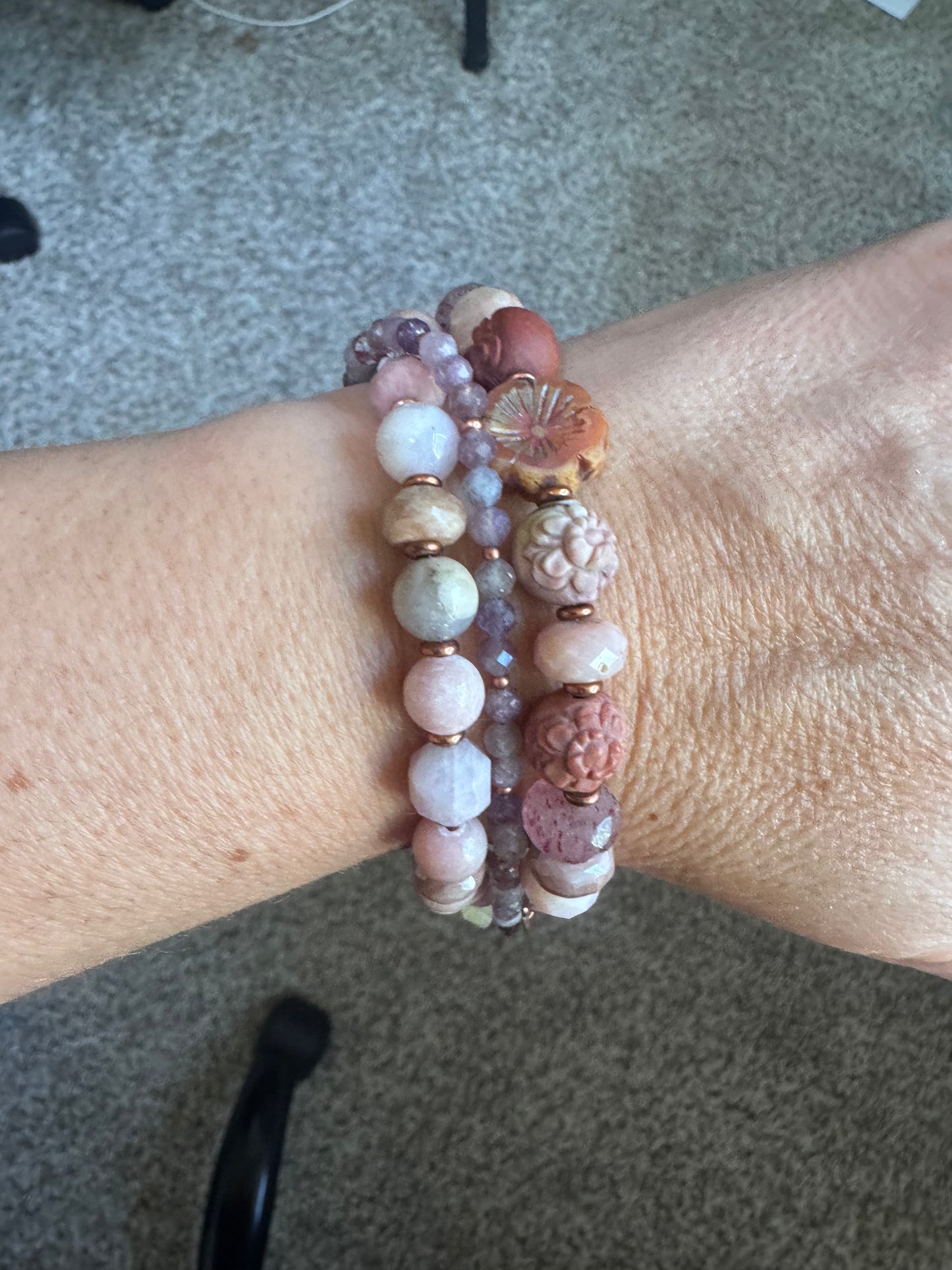 Mongolian agate carved flower, Ruby, Czech glass flower, rhodochrosite, strawberry quartz, moonstone, pink opal, purple mica, Lilac Lepidolite and copper clasp.
