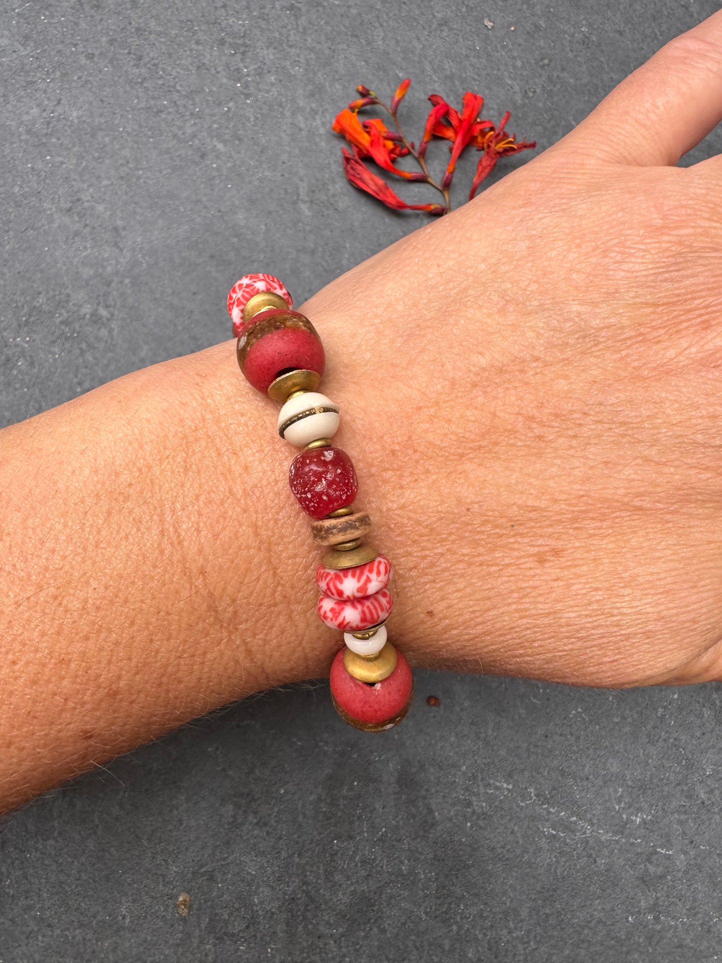 Red African glass, bone, wood, bronze metal, bracelet