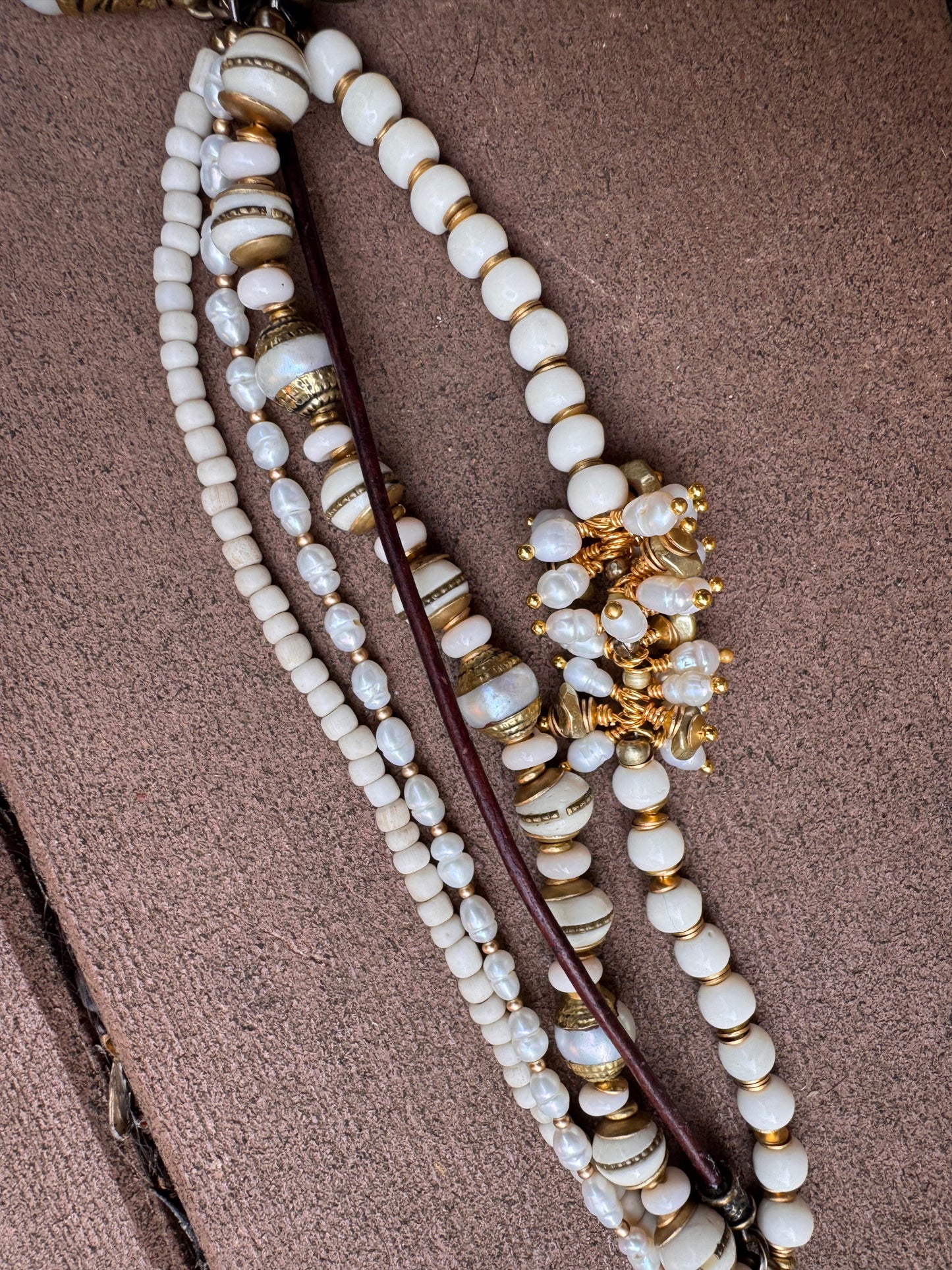 Pearls, leather, glass, brass metal bracelet.