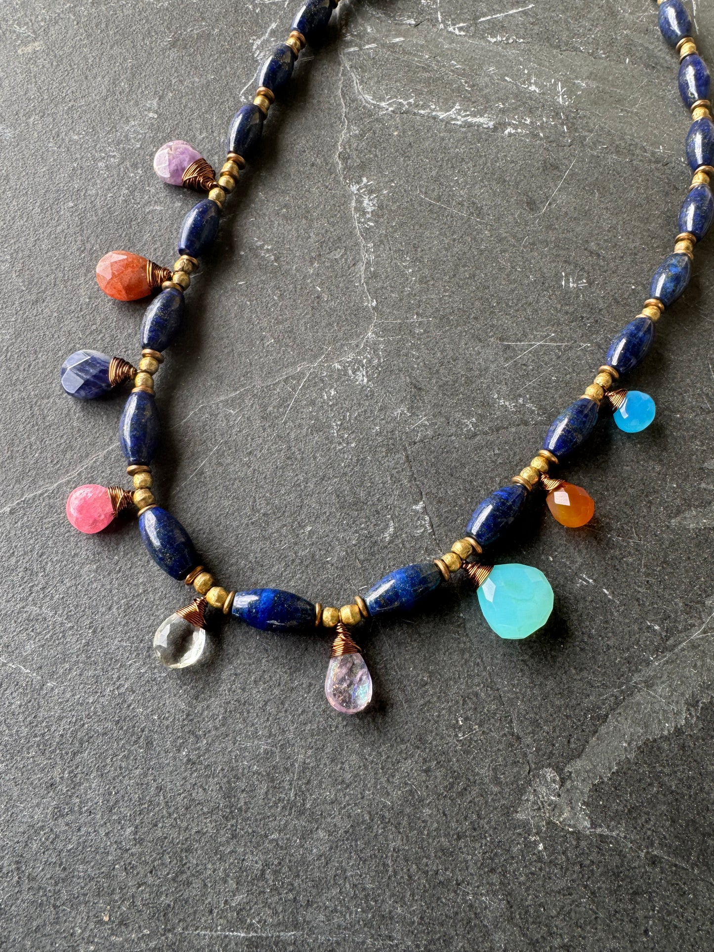 Lapis stone and mixed gemstone necklace. African brass.