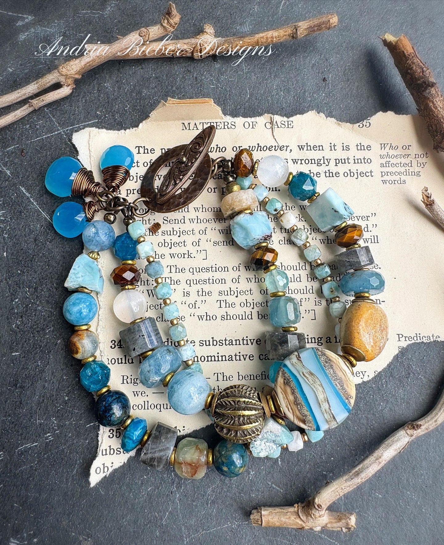 Larimar gemstone, aquamarine, moonstone, blue chalcedony, labradorite, apatite, tiger eye, lampwork , ceramic, Amazonite stone, brass metal.