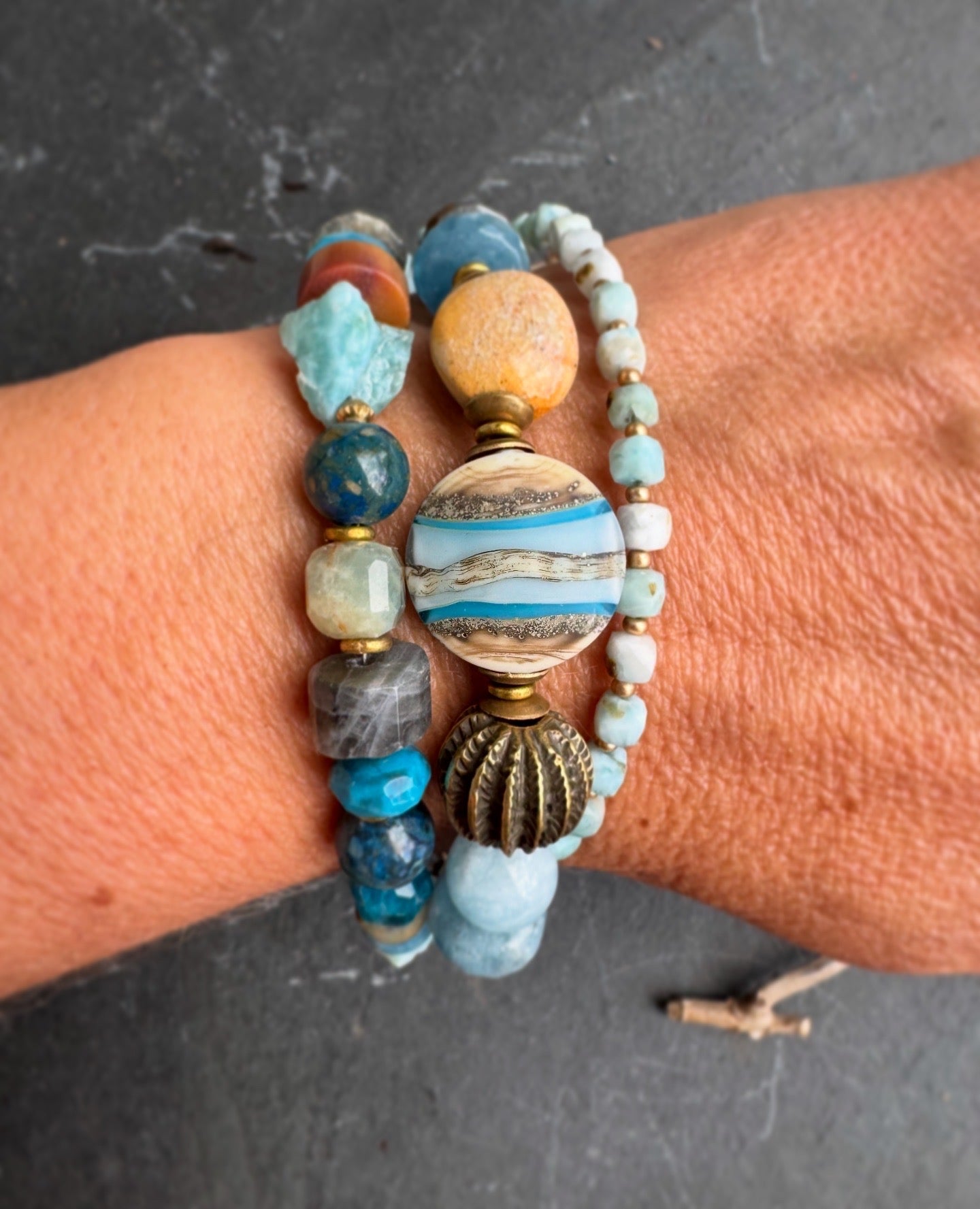 Larimar gemstone, aquamarine, moonstone, blue chalcedony, labradorite, apatite, tiger eye, lampwork , ceramic, Amazonite stone, brass metal.