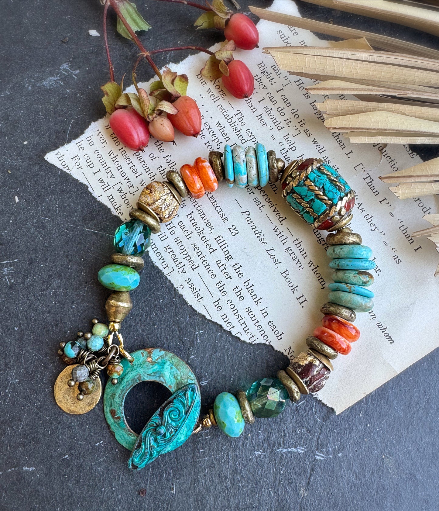 African brass, turquoise stone, Nepal center bead with coral and turquoise stone inlay, spiny oyster, African ceramic beads, Czech glass and custom made patina clasp. bracelet, jewelry