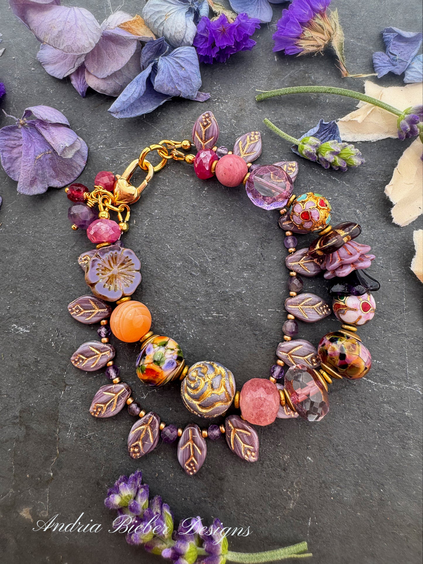 lampwork glass, mixed pink stone, Cloisonné beads, Czech glass, pink moonstone and amethyst. African brass, Czech glass leaves.