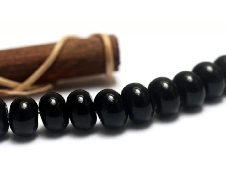 Ten Opaque Black Spacer Beads