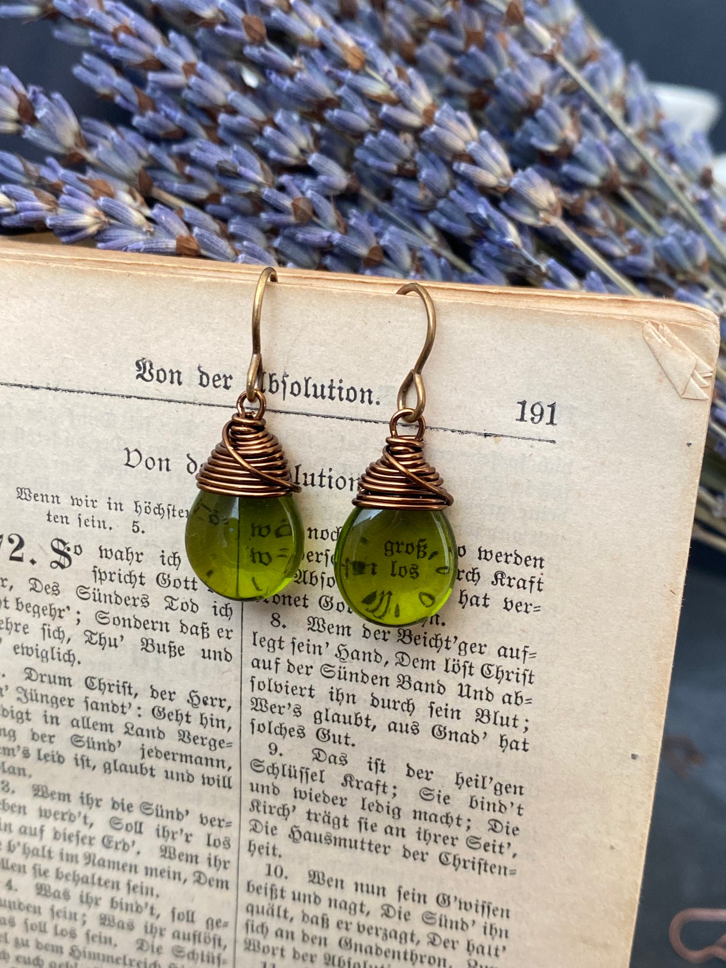 Teardrop glass in olive green and bronze wire wrapped earrings.