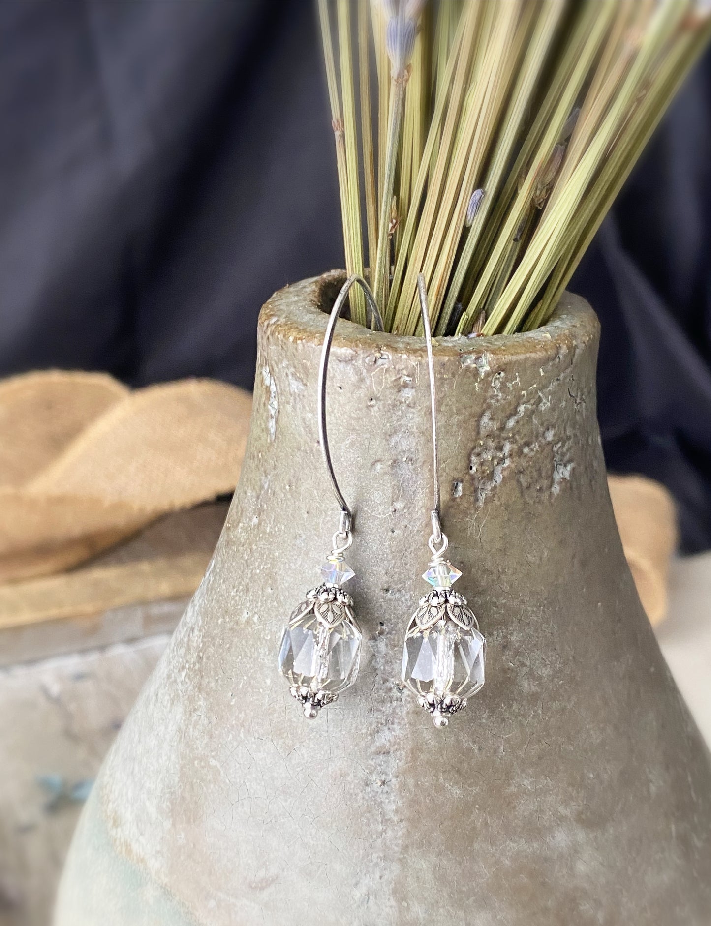 Shiny Czech glass, detailed floral bead caps, crystals, silver metal, drop earrings