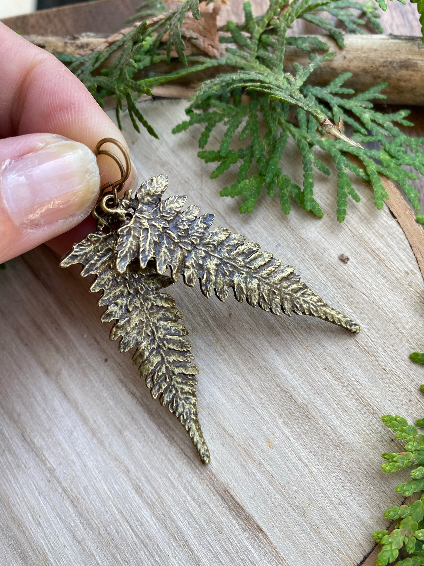 Bronze Ferns. Fern detailed bronze charm earrings. - Andria Bieber Designs