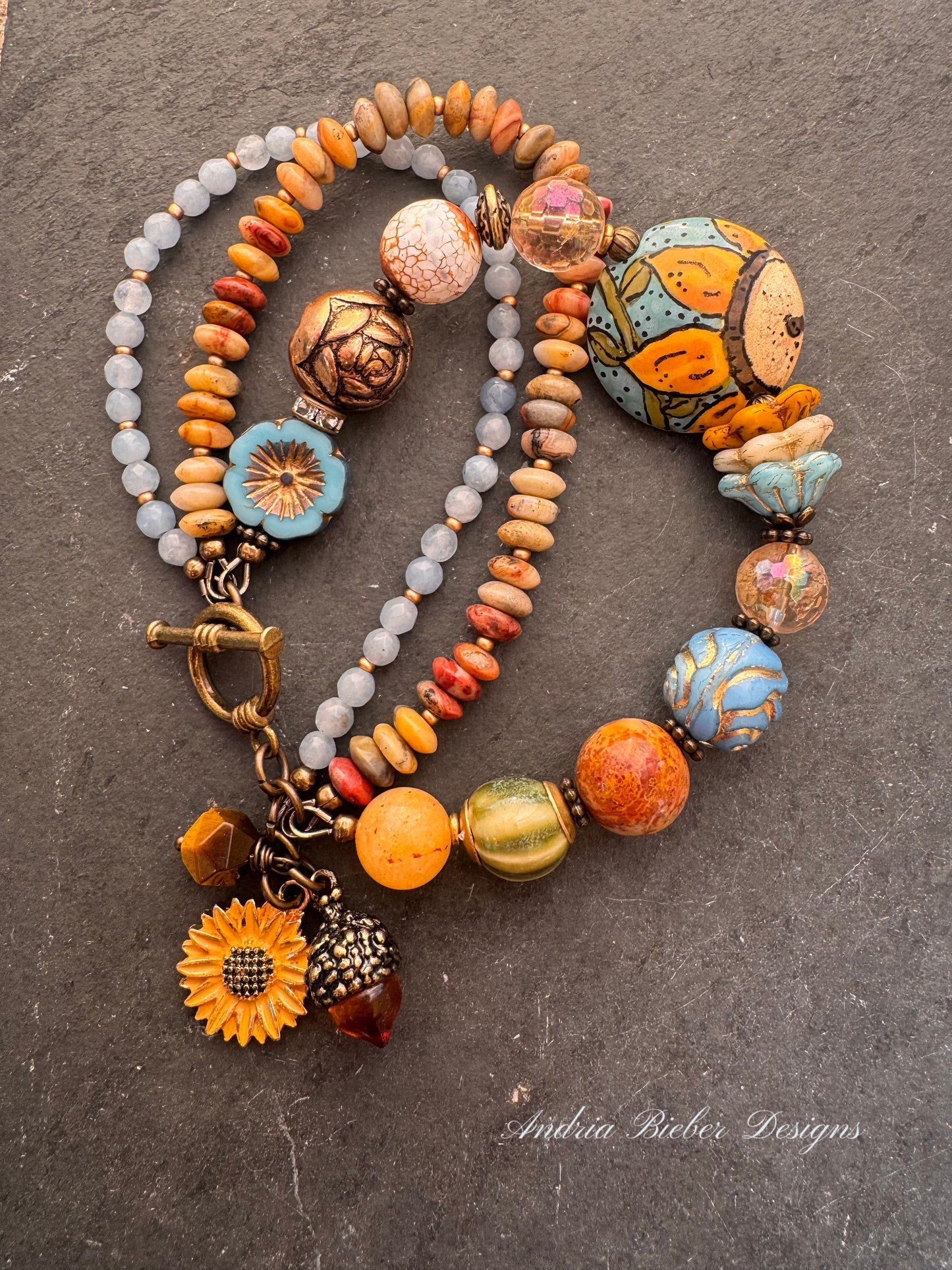 Blue sky Sunflower. 🌻ceramic beads, Handmade lampwork glass, citron, crazy lace, aquamarine, Czech glass, bronze metal, bracelet.