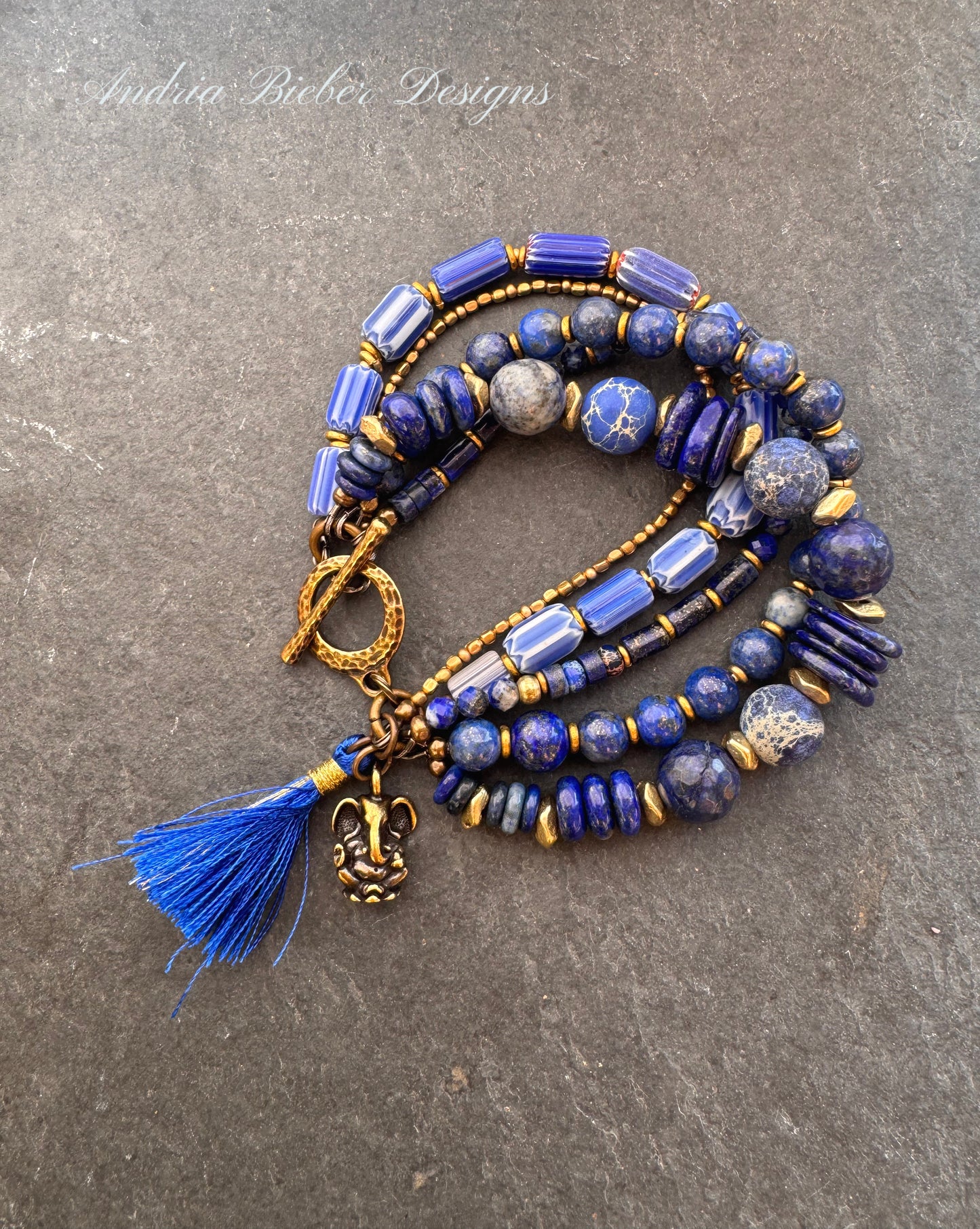 Lapis lazuli, African glass, agate, brass metal bracelet.
