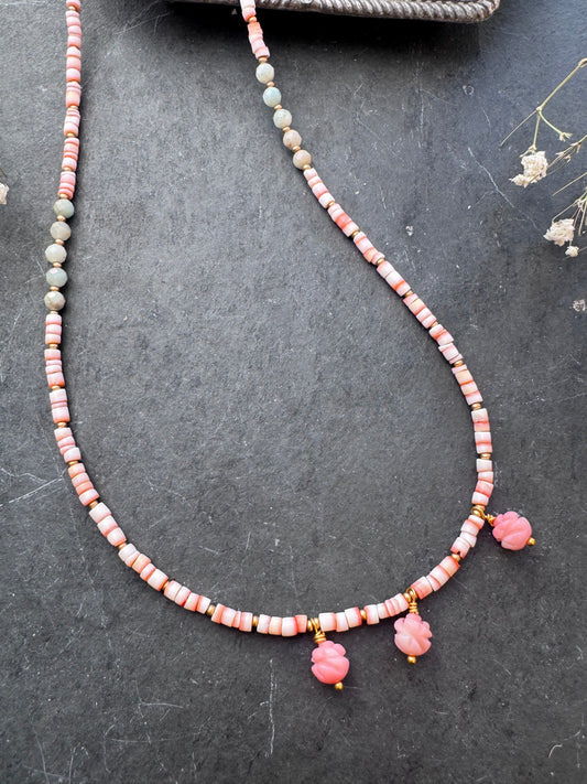 With conch shell rondelle heishi, pink opal carved stone flower beads and gold metal.