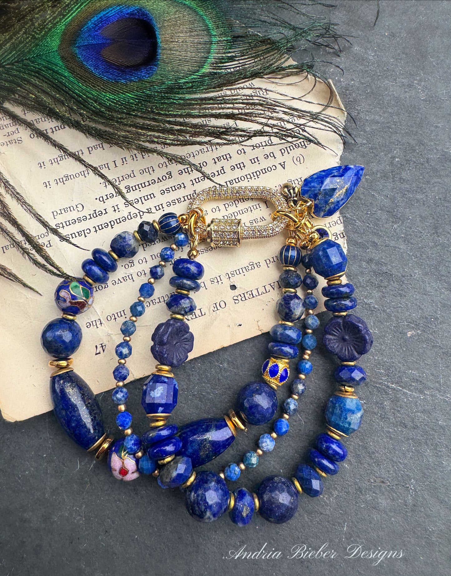 Lapis lazuli stone, cloisonné, Czech glass, gold metal, bracelet. Rhinestone carabiner clasp. ￼