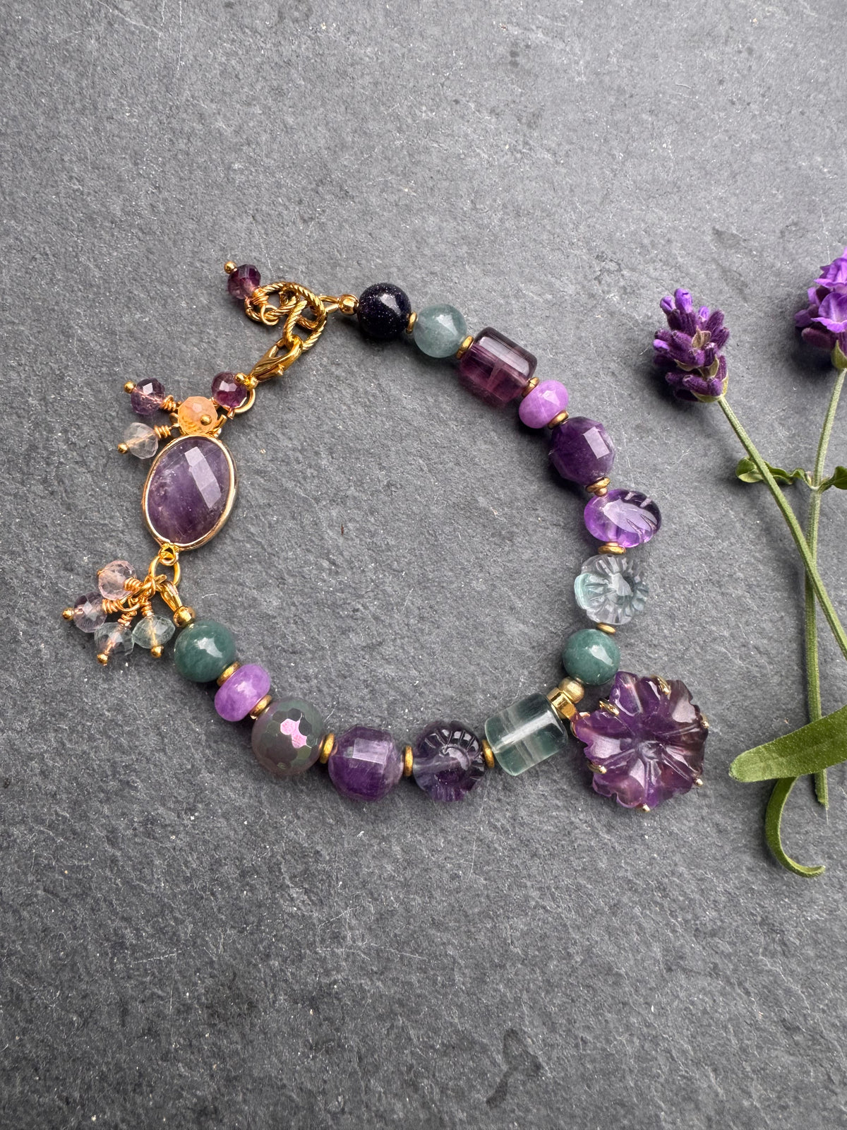 Fluorite, amethyst, jade and gold metal bracelet.