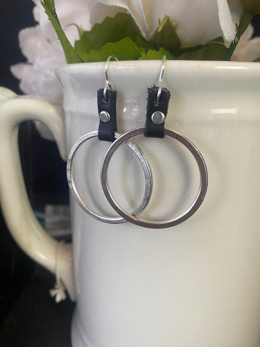 Black leather, sterling silver hammered hoops, earrings, jewelry.