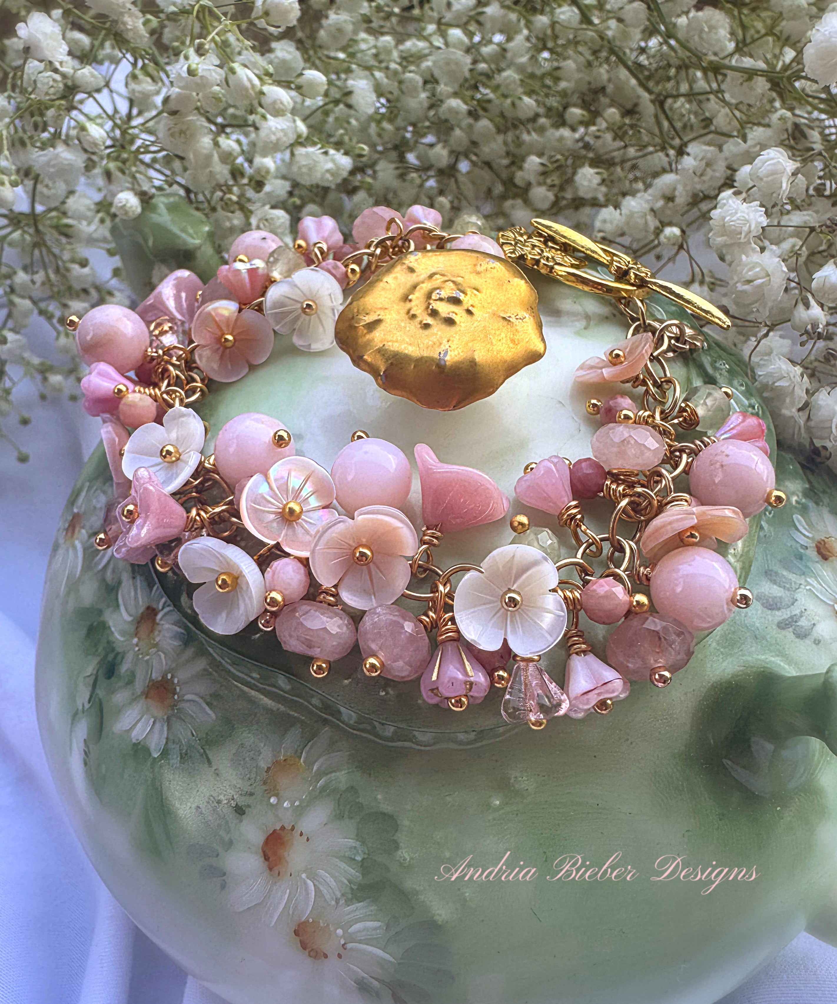 Pink opal, pink shell blossoms, rose quartz, peridot, gold metal