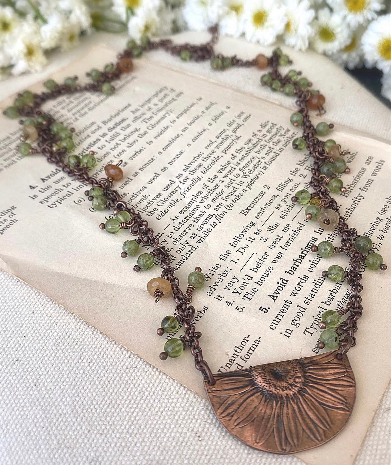 Sunflower pendant, peridot stone, copper metal, necklace