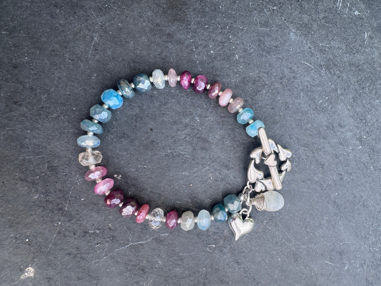 Charm, blue and pink moonstone bracelet. Silver metal bracelet.