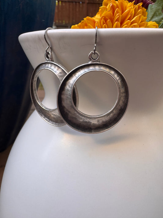 Hammered hoops. Sterling silver earrings, jewelry.