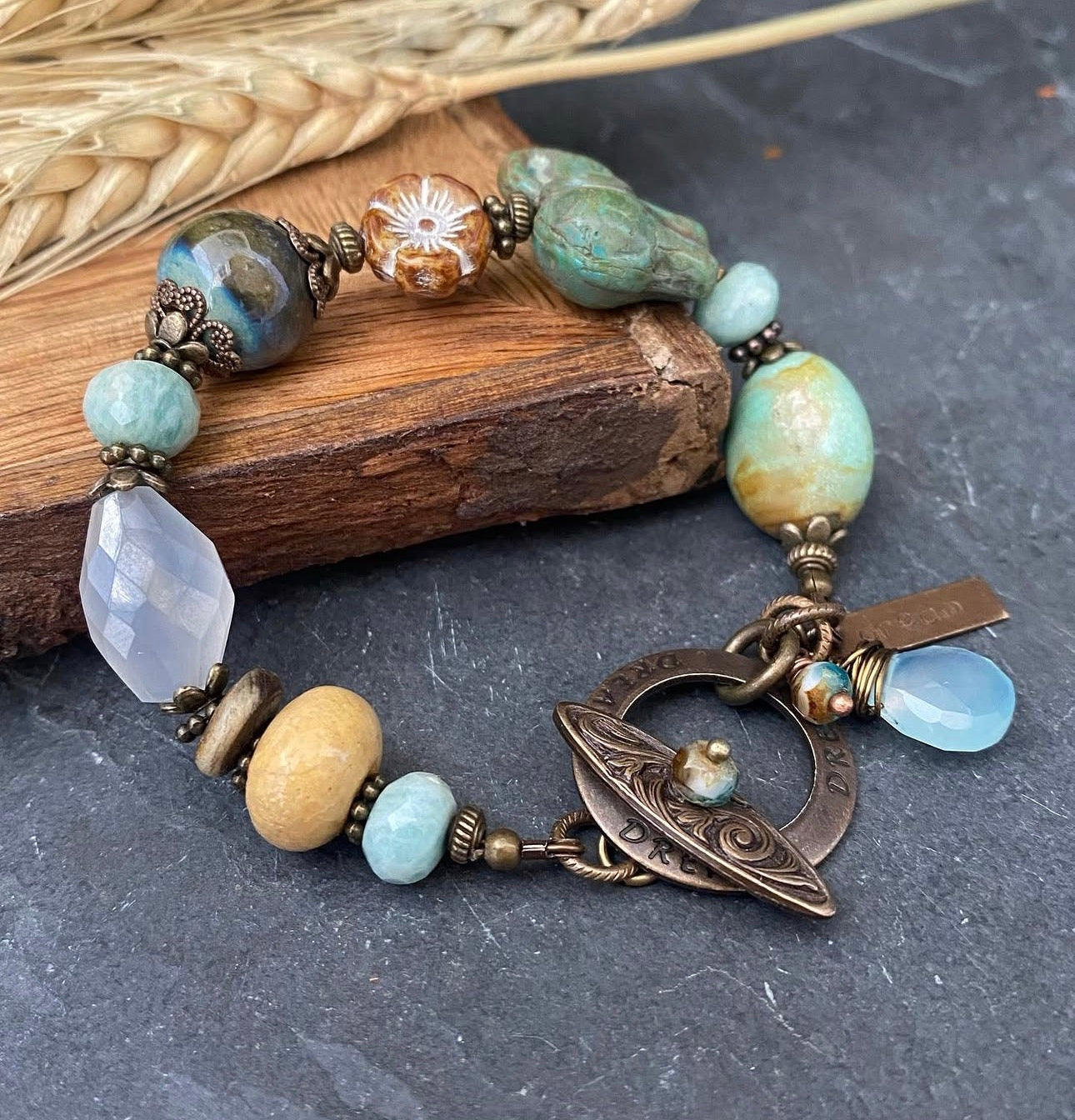 Turquoise, chalcedony, ceramic, Czech glass, Vintaj brass bracelet.