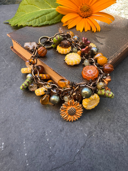 Sunflower and autumn. Mixed gemstone, Czech glass, bronze metal, charm bracelet.