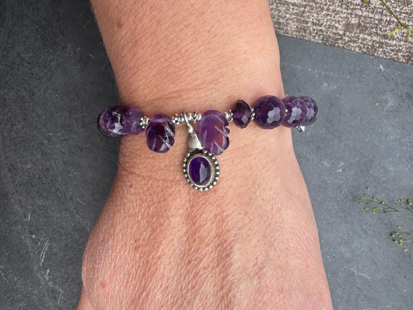 Amethyst engraved stone, faceted rounds, sterling silver drop, rhinestone clasp.925. Bracelet