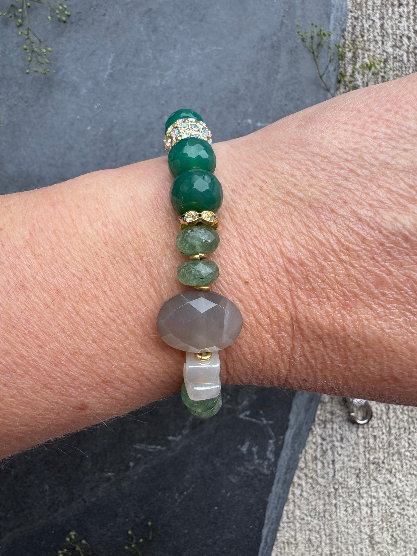 Green onyx faceted stone, green quartz, moonstone,jaguar gold rhinestone clasp.