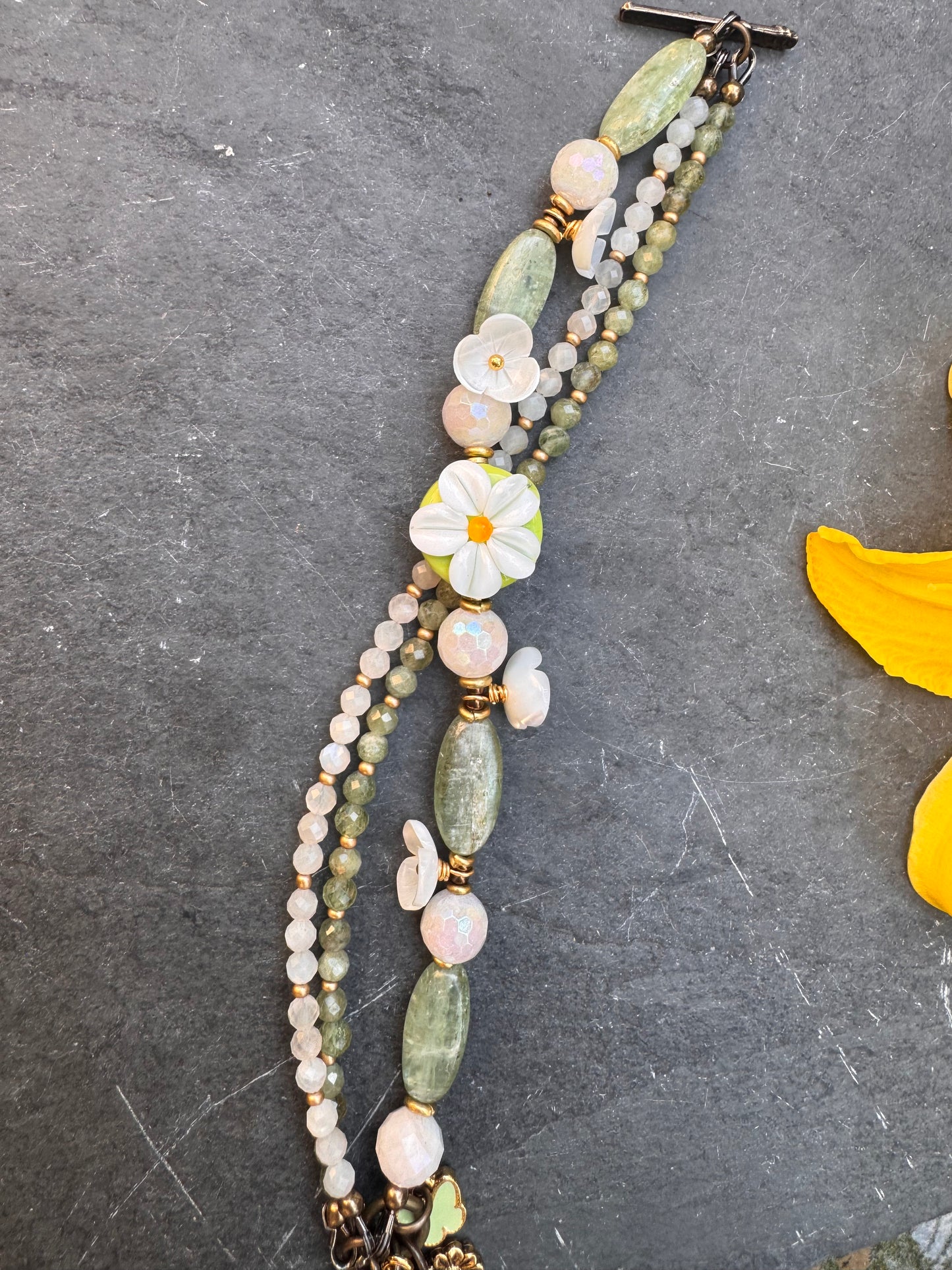 White daisy. Handmade lampwork glass, shell flowers, kyanite, moonstone, bronze metal, bracelet