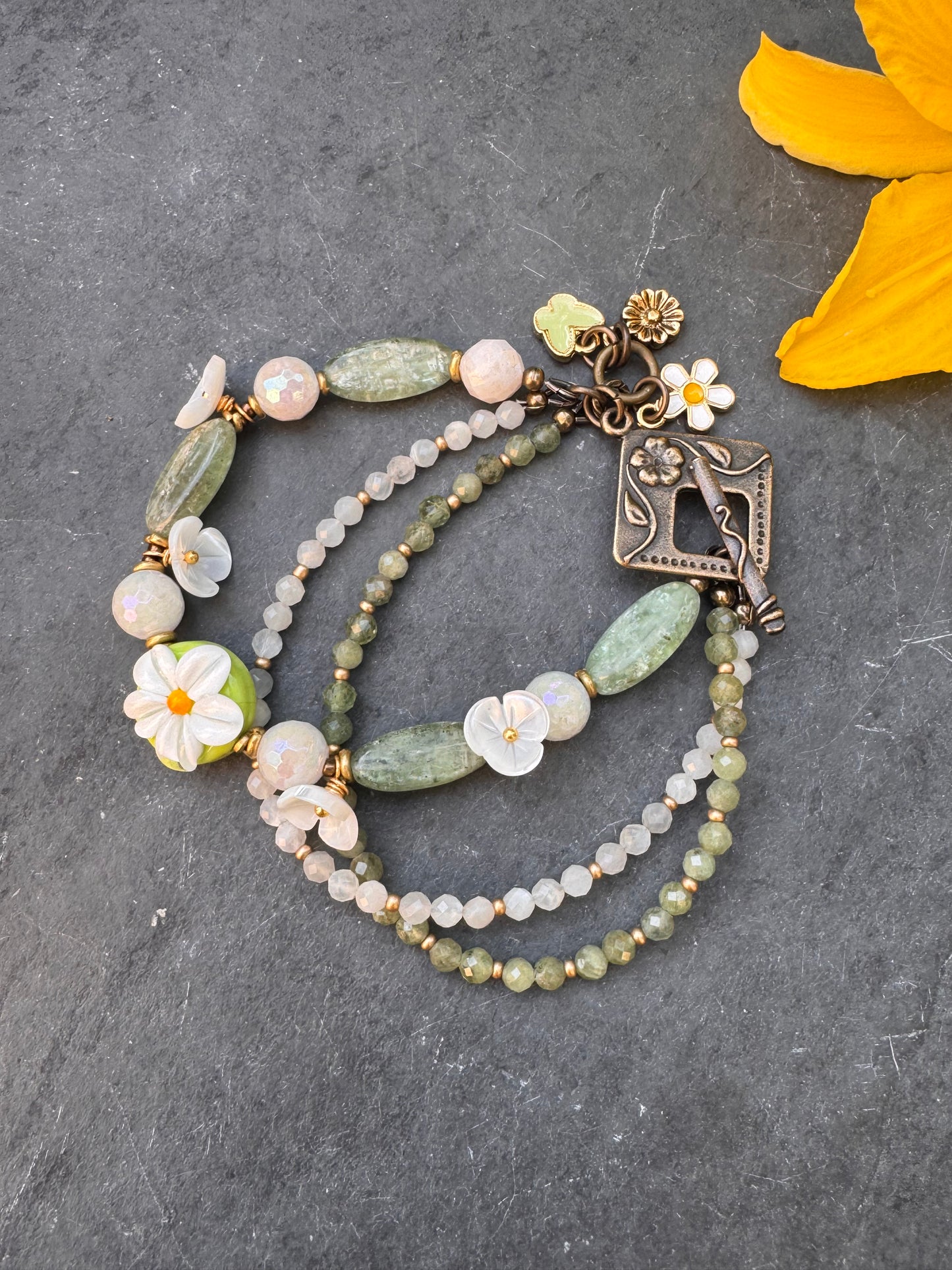 White daisy. Handmade lampwork glass, shell flowers, kyanite, moonstone, bronze metal, bracelet