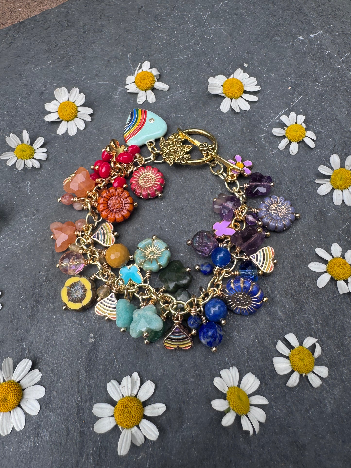 Rainbow bracelet. Mixed gemstone, mixed Czech glass, charms and gold metal bracelet.