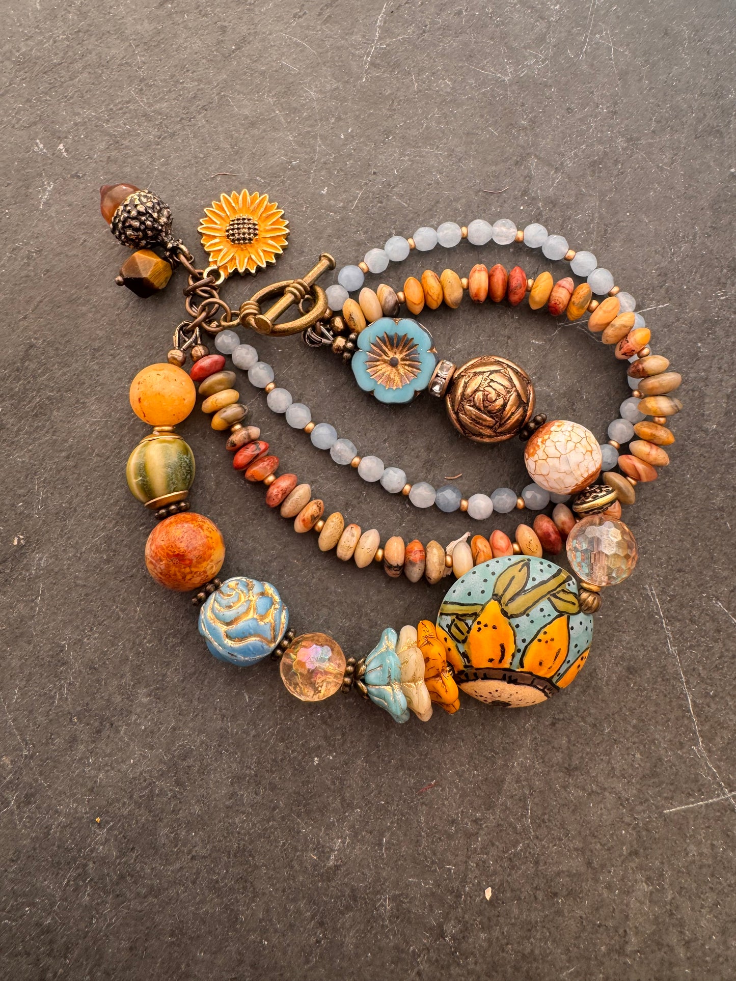 Blue sky Sunflower. 🌻ceramic beads, Handmade lampwork glass, citron, crazy lace, aquamarine, Czech glass, bronze metal, bracelet.