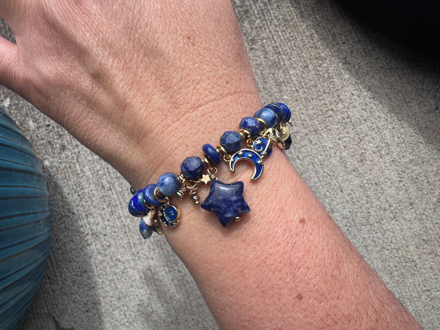 Space Charm bracelet. Mixed gemstone, charms and gold metal bracelet.
